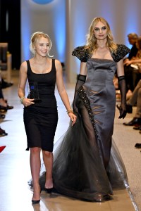 Designer Ainsley Goldman and a model walk the runway during the FIT's 2026 Future of Fashion runway show on May 07, 2026 in New York City.