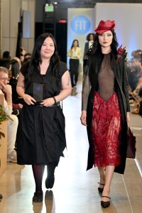 Designer Kat Lin and a model walk the runway during the FIT's 2026 Future of Fashion runway show on May 07, 2026 in New York City.