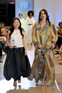 Designer Ellen Kim and a model walk the runway during the FIT's 2026 Future of Fashion runway show on May 07, 2026 in New York City.