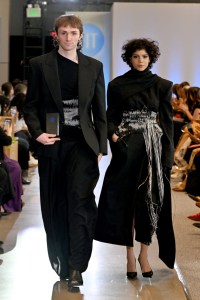 Designer Tyler Mervine and a model walk the runway during the FIT's 2026 Future of Fashion runway show on May 07, 2026 in New York City.