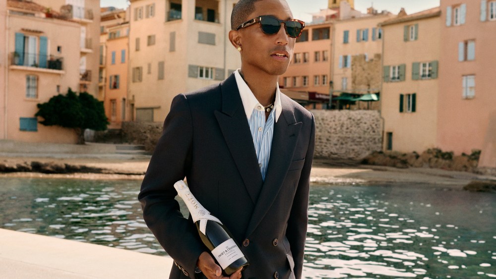 Pharrell Williams with a limited-edition bottle of Moët & Chandon Ice Impérial Champagne
