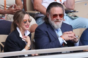PARIS, FRANCE - MAY 24: Britney Theriot and Russell Crowe attend Day One of the 2026 French Open on May 24, 2026 in Paris, France. (Photo by Stephane Cardinale - Corbis/Corbis via Getty Images)