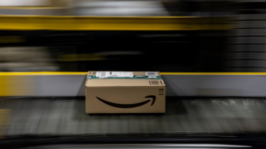 BRIESELANG, GERMANY - NOVEMBER 18: A package flows along a conveyor belt at an Amazon warehouse on November 18, 2021 in Brieselang, Germany. Many shoppers who fear gifts will be lacking due to the global supply chain disruption are buying their Christmas gifts early this year, both online and at brick and mortar retailers. (Photo by Maja Hitij/Getty Images)