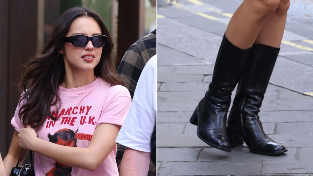 Olivia Rodrigo in a pair of crinkled black leather knee-high boots while out promoting "you seem pretty sad for a girl so in love" in London on Tuesday.